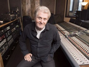 Tom Cochrane poses for a photo in an interview with