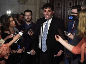 Minister of Fisheries, Oceans and the Canadian Coast Guard Dominic LeBlanc speaks to reporters in the Foyer of the House of Commons on Parliament Hill after a cabinet meeting in Ottawa on April 24, 2018. Federal Fisheries Minister Dominic LeBlanc says he will meet with representatives from the lobster fishery today in New Brunswick. LeBlanc hasn't revealed the nature of the discussions in Moncton, but lobster fishermen had asked earlier this week for an emergency meeting with the minister.