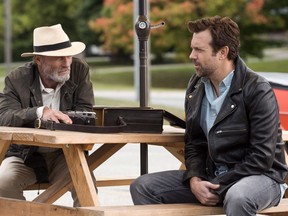 This image released by Netflix shows Ed Harris, left, and Jason Sudeikis in a scene from "Kodachrome."
