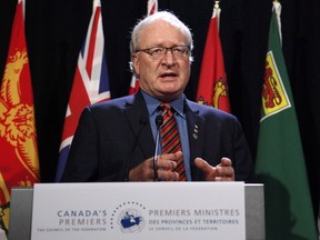 PEI premier Wade MacLauchlan speaks to the media at the Chateau Laurier hotel before the First Ministers' Meeting in Ottawa on December 9, 2016. The Prince Edward Island government will hand down its 2018 budget Friday, amid what one observer says are growing signs of an early provincial election call this spring. Don Desserud, a professor of political science at UPEI, says Premier Wade MacLauchlan may be tempted to call a May or early June election while the Island's economy is relatively strong and before the opposition parties have additional time to fully prepare.