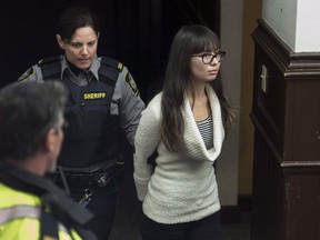 American Lindsay Souvannarath arrives at provincial court in Halifax on March 6, 2015. The family of Lindsay Souvannarath, the American woman sentenced to life in prison for plotting a Valentine's Day shooting rampage at a Halifax mall, says she would never have carried out the murderous plan.In a newly released letter written to a Nova Scotia judge, her parents describe her as a sad and lonely person who is sensitive and not capable of violence.