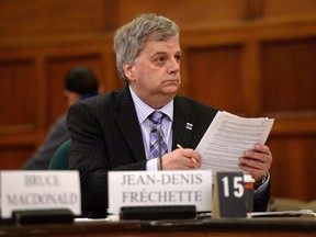 Parliamentary Budget Officer Jean-Denis Frechette appears at Commons finance committee on Parliament Hill in Ottawa on May 26, 2015. The federal budget watchdog says the Trudeau government is on track to run deficits nearly $8 billion deeper than expected over the next two years. A new analysis by the parliamentary budget officer estimates Ottawa will post a $22.1-billion shortfall this fiscal year, which would be $4 billion larger than the government's projection of $18.1 billion in its February budget.