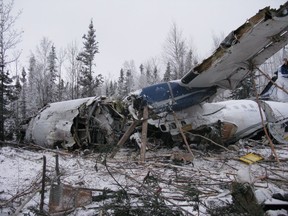 The wreckage of an aircraft is seen near Fond du Lac, Sask. on Thursday, December 14, 2017 in this handout photo. Investigators say a plane that crashed in a remote northern Saskatchewan community had ice on it when it took off.