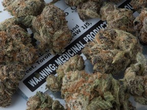 Medical marijuana is shown with its packaging label in Toronto, Nov. 5, 2017. The Nova Scotia Court of Appeal has struck down a provincial human rights board decision that said an injured man's prescribed medical marijuana must be covered by his employee insurance plan.