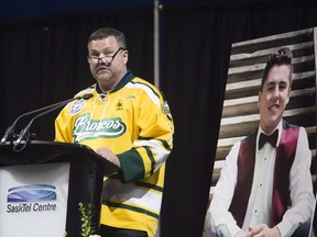 Evan Scotts father, Scott Thomas gives an eulogy for his deceased son Evan Thomas in Saskatoon, Sask., on Monday, April, 16, 2018. Evan Thomas ate Fruit Loops for breakfast, went to the rink for a skate, then had a nap before boarding the Humboldt Broncos bus for a playoff game.