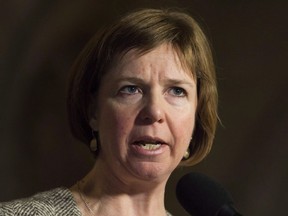 NDP MP Sheila Malcolmson speaks with the media in Ottawa on Thursday, November 30, 2017. The New Democrats say that if the Liberals were serious about ensuring men and women get equal pay for work of equal value, they would be moving faster on introducing legislation - and attaching a dollar amount.THE CANADIAN PRESS/Adrian Wyld