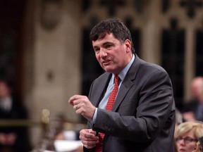 Minister of Fisheries, Oceans and the Canadian Coast Guard Dominic LeBlanc responds to a question during Question Period in the House of Commons in Ottawa on February 15, 2018. Canada's fisheries minister wants the G7 to use military and other surveillance technology to name and shame countries that are conducting massive illegal overfishing operations. Dominic LeBlanc isn't ready to name countries yet, but he says recent Canadian Forces satellite images that he has seen shocked him, and would shock the conscience of people if they were made public.