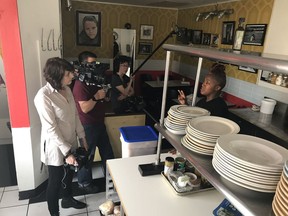 Director Maya Gallus, left, talks to chef Suzanne Barr, right, during filming of the documentary "The Heat: A Kitchen (R)evolution" in this undated handout photo. In making a documentary about top female chefs, Toronto filmmaker Maya Gallus noticed an ironic theme emerge. "Women were fighting for years to get out of the kitchen and now women are fighting to get their rightful place back in the kitchen," she said in an interview. "The Heat: A Kitchen (R)evolution," which opens the Hot Docs Canadian International Documentary Festival on Thursday, details the gender barriers women have faced in climbing the ranks of the professional culinary world.