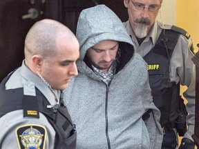 Nicholas Butcher arrives at provincial court in Halifax on Tuesday, April 12, 2016. After three weeks of evidence, the Crown has closed its case against a Halifax law school graduate accused in the violent death of his girlfriend Kristin Johnston.