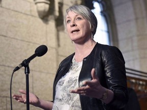Minister of Employment, Workforce Development and Labour Patty Hajdu speaks to reporters during a weekend meeting of the national caucus on Parliament Hill in Ottawa on March 25, 2017. It was February 2017 when the first letter about anti-abortion groups and the Canada Summer Jobs program landed in Labour Minister Patty Hajdu's office.THE CANADIAN PRESS/Justin Tang