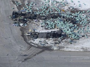 The wreckage of a fatal crash involving the Humboldt Broncos hockey team is is seen outside of Tisdale, Sask., on Saturday, April, 7, 2018.