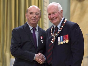 Bob Cole, left, with former Governor General David Johnston after Cole became a member of the Order of Canada in 2016.