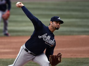 Atlanta Braves starting pitcher Anibal Sanchez (19) delivers during the first inning of a baseball game against the Chicago Cubs on Friday, April 13, 2018, in Chicago.