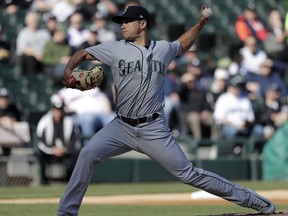 Seattle Mariners starting pitcher Marco Gonzales delivers during the first inning of a baseball game against the Chicago White Sox, Tuesday, April 24, 2018, in Chicago.