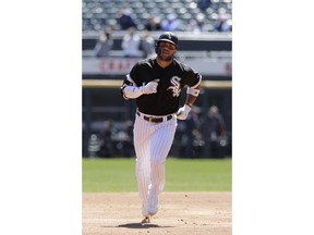 Chicago White Sox's Yoan Moncada rounds the bases after hitting a home run off Seattle Mariners starting pitcher Felix Hernandez during the first inning of a baseball game Wednesday, April 25, 2018, in Chicago.