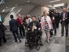 Kent Hehr, MP for Calgary Centre, arrives with his wife Deanna Holt before attending a workshop titled "Ensuring Safe Spaces and Ending Harassment" during the federal Liberal national convention in Halifax on Saturday, April 21, 2018. The former Sport and Disabilities Minister, Hehr resigned from cabinet following allegations of sexual harassment.
