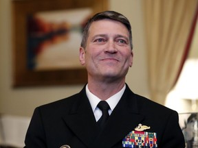 U.S. Navy Rear Adm. Ronny Jackson, M.D., left, sits with Sen. Johnny Isakson, R-Ga., chairman of the Veteran's Affairs Committee, before their meeting on Capitol Hill, Monday, April 16, 2018 in Washington. Jackson is President Donald Trump's nominee to be the next Secretary of Veterans Affairs.