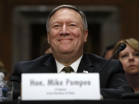 CIA Director Mike Pompeo, picked to be the next secretary of state, smiles after his introductions before the Senate Foreign Relations Committee during a confirmation hearing on his nomination to be Secretary of State, Thursday, April 12, 2018 on Capitol Hill in Washington. Pompeo's remarks will be the first chance for lawmakers and the public to hear directly from the former Kansas congressman about his approach to diplomacy and the role of the State Department, should he be confirmed to lead it.