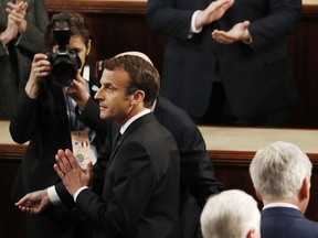 French President Emmanuel Macron arrives for his address to a joint meeting of Congress on Capitol Hill in Washington, Wednesday, April 25, 2018.