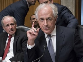 Sen. Jim Risch, R-Idaho, left, and Senate Foreign Relations Committee Chairman Bob Corker, R-Tenn., listen to comments during maneuvering on the confirmation vote for President Donald Trump's nominee for secretary of state, Mike Pompeo, who has faced considerable opposition before the panel, on Capitol Hill in Washington, Monday, April 23, 2018.