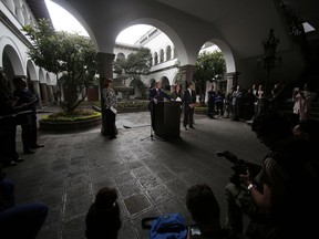 Foreign Ministers, at the podium from left to right, Colombia's Foreign Minister Maria Angela Holguin, Colombia's Defense Minister Luis Carlos Villegas, Ecuador's Foreign Minister Fernanda Espinosa and Ecuador's Defense Minister Patricio Zambrano give a news conference after a meeting at the government palace in Quito, Ecuador, Monday, April 16, 2018. The meeting was called after a team of journalists was recently killed on their shared border.