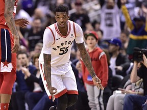 Toronto Raptors' Delon Wright celebrates his late game three-point field goal against the Washington Wizards' during second half game five of round one NBA playoff basketball action in Toronto on Wednesday, April 25, 2018.
