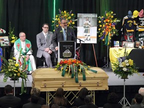 Toby Boulet makes a closing remark at a funeral for his son, Humboldt Broncos' Logan Boulet at the Nicholas Sheran Arena in Lethbridge, Alta. on Saturday, April 14, 2018.