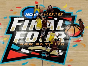 Michigan's Isaiah Livers (4) and Loyola-Chicago's Cameron Krutwig (25) battle for the ball at the tip off during the first half in the semifinals of the Final Four NCAA college basketball tournament, Saturday, March 31, 2018, in San Antonio.