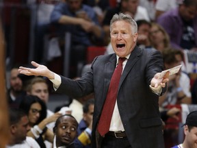 Philadelphia 76ers head coach Brett Brown directs his team in the first quarter of play against the Miami Heat in Game 4 of a first-round NBA basketball playoff series, Saturday, April 21, 2018, in Miami.