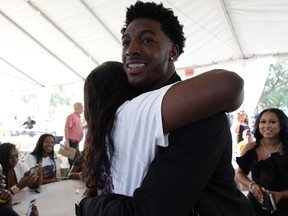 Alabama wide receiver Calvin Ridley is greeted by well-wishers as he arrives for an NFL draft watch party in Fort Lauderdale, Fla., Thursday, April 26, 2018.