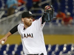 Miami Marlins' Dan Straily delivers a pitch during the first inning of a baseball game against the Philadelphia Phillies, Monday, April 30, 2018, in Miami.