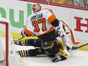 Flyers goaltender Brian Elliott collides with Pittsburgh's Olli Maatta during Game 2 of of their first-round series. Philadelphia also used Petr Mrazek and Michal Neuvirth in net during the series.