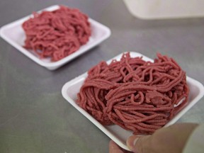 Fresh ground beef is packed at a local butcher shop October 1, 2012 in Levis Quebec.