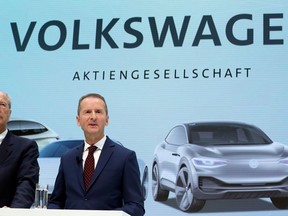 FILE - In this April 13, 2018 file photo Herbert Diess, right, new CEO of the Volkswagen stock company, and Hans Dieter Poetsch, chairman of the board of directors of the Volkswagen stock company, address the media during a press conference in Wolfsburg, Germany. Automaker Volkswagen will present the figures of the first quarter 2018 on Thursday, April 26, 2018