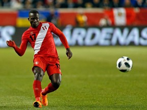 In this photo taken on Tuesday, March 27, 2018 Peru defender Luis Advincula in action against Iceland during the second half of an international friendly soccer match Tuesday, in Harrison, N.J.