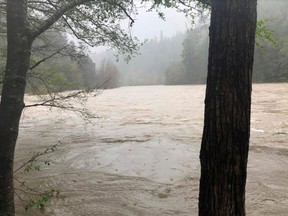 File - This photo released April 12, 2018, by The Mendocino County Sheriff's Office shows the Eel River in Northern California. Authorities searching for a family whose SUV plunged into a rain-swollen Northern California river found the vehicle and the body of a man and a girl inside it. The Mendocino County Sheriff's Office said Monday, April 16, 2018, that searchers located the car Sunday and recovered the bodies of Sandeep Thottapilly and Saachi Thottapilly.