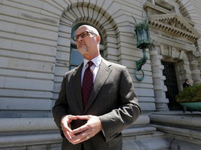 File - In this July 12, 2017, file photo, Jeffrey Kerr, general counsel to the People for the Ethical Treatment of Animals (PETA), speaks to reporters outside of the 9th U.S. Circuit Court of Appeals in San Francisco. A monkey cannot sue over rights to photos that it took because U.S. copyright law does not allow animals to file lawsuits, a federal appeals court ruled on Monday, April 23, 2018, in a novel case over selfies taken by a crested macaque. A unanimous, three-judge panel of the 9th U.S. Circuit Court of Appeals upheld a lower court ruling dismissing a lawsuit by the People for the Ethical Treatment of Animals against David Slater, the photographer whose camera was used by the monkey in 2011 to take the photos. Kerr said the group was reviewing the opinion and had not decided yet whether it would appeal.