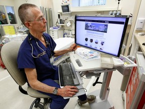 FILE - In this March 9, 2017 file photo, Dr. Garen Wintemute, an emergency room physician at the University of California, Davis, Medical Center, shows the website of the Bureau of Alcohol, Tobacco and Firearms, on a computer in the hospital in Sacramento, Calif. Gun deaths have fallen in California over a 16 year period ending in 2015, driven largely by a decline of African-American homicide victims, a recent and rare scientific study of firearm violence found. Researchers at the University of California, Davis published their findings in the May issue of Annals of Epidemiology after reviewing the 50,921 firearm deaths recorded in California between 2000 and 2015. The researchers said it's the first such deep analysis of California gun deaths in 30 years.