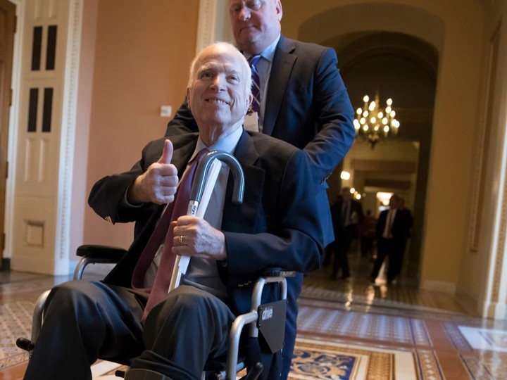  FILE – In this Dec. 1, 2017, file photo, Sen. John McCain, R-Ariz., leaves a closed-door session on Capitol Hill in Washington.