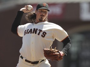 San Francisco Giants starting pitcher Jeff Samardzija throws to the Washington Nationals during the first inning of a baseball game Wednesday, April 25, 2018, in San Francisco.