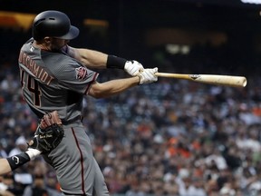 Arizona Diamondbacks' Paul Goldschmidt drives in a run with a triple against the San Francisco Giants during the first inning of a baseball game Monday, April 9, 2018, in San Francisco.