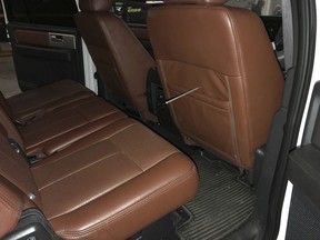 The interior of Claud "Tex" McIver's Ford Expedition, where the shooting took place, with a wooden dowel tracing the path of the bullet, in the basement of the courthouse after the jury had a chance to look at it during McIver's trial, Monday, April 16, 2018, in Atlanta. McIver faces charges including murder in the September 2016 death of his wife, Diane McIver.