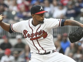 Atlanta Braves starting pitcher Julio Teheran works against the New York Mets during the first inning of a baseball game Saturday, April 21, 2018, in Atlanta.