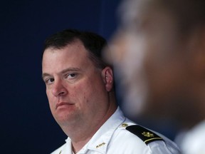 Maj. Michael O'Connor looks on during a news conference where they told reporters that a body found in Chattahoochee River, Tuesday has been identified as missing CDC employee Timothy Cunningham during a news conference Thursday, April 5, 2018, in Atlanta. A medical examiner said the cause of death was drowning and she found no signs of foul play.