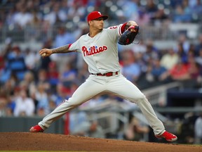 Philadelphia Phillies starting pitcher Vince Velasquez delivers in the first inning of a baseball game against the Atlanta Braves, Wednesday, April 18, 2018, in Atlanta.
