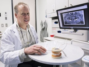 Dentist Dr.John Drummond poses at the McGill University Faculty of Dentistry in Montreal, Thursday, April 12, 2018. Canadians spend about $12 billion per year on dental services, but six million people annually avoid dentists because of costs, said a 2014 report by the Canadian Academy of Health Sciences.THE CANADIAN PRESS/Graham Hughes