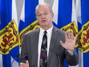 Justice Minister Mark Furey fields question as he holds a bill briefing on the Cannabis Control Act in Halifax on Tuesday, April 3, 2018.