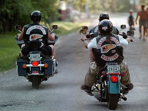 A trio of Manitoba Hells Angels travel down a north Winnipeg street Thursday July 18.  Angels from across the country in 2002