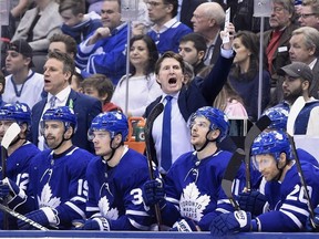 Toronto Maple Leafs coach Mike Babcock gestures against the Boston Bruins on April 19.