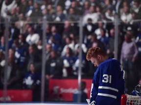 Toronto Maple Leafs goaltender Frederik Andersen looks down during a moment of silence for the victims of the Toronto van attack on April 23.